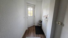 Eingangsbereich Attraktive Eigentumswohnung: vermietete 2-Zimmer Erdgeschosswohnung in zentraler Lage von M�lln provisionsfrei zu verkaufen
