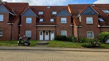 Au�enansicht Attraktive Eigentumswohnung: vermietete 2-Zimmer Erdgeschosswohnung in zentraler Lage von M�lln provisionsfrei zu verkaufen