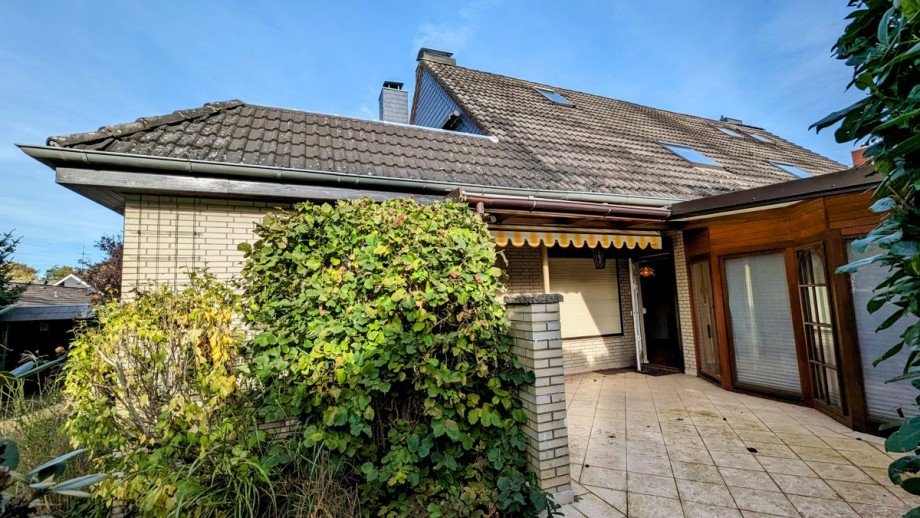 Gartenansicht mit Wintergarten Doppelhaush�lfte Schwarzenbek